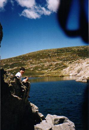 James descending a rock at Blue Lake