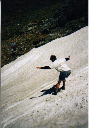 James glissades down a snowdrift